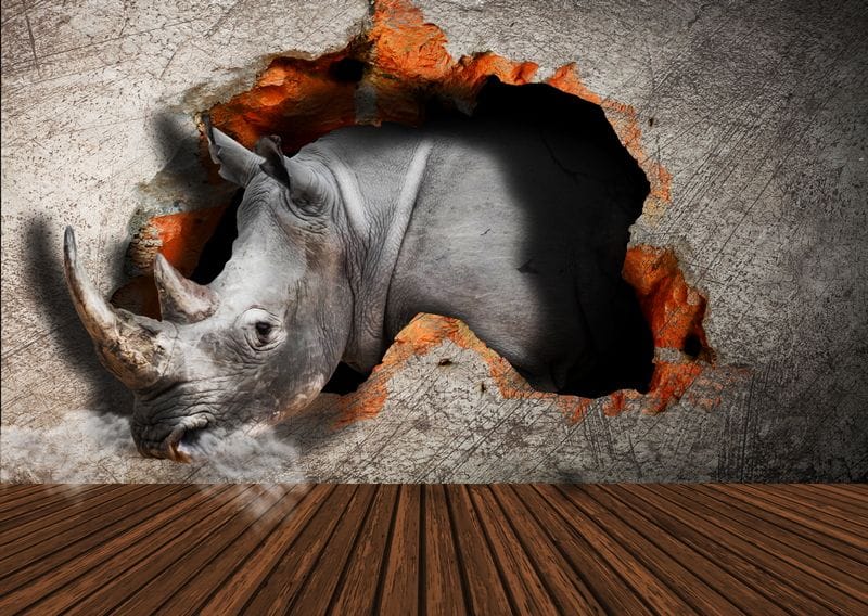3Д носорог пробивает стену