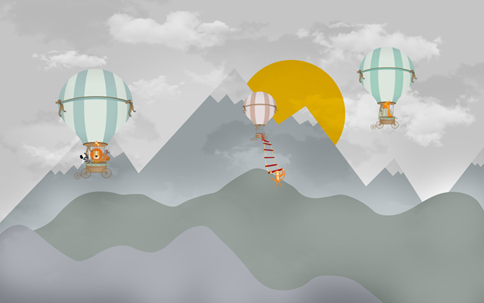 Воздушные шары с животными на фоне серых гор